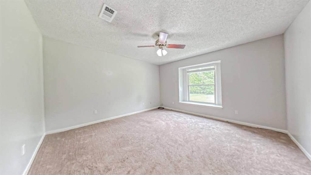 2801 Florence Street Kilgore, TX 75662 - Photo 17 of 35 Primary Bedroom