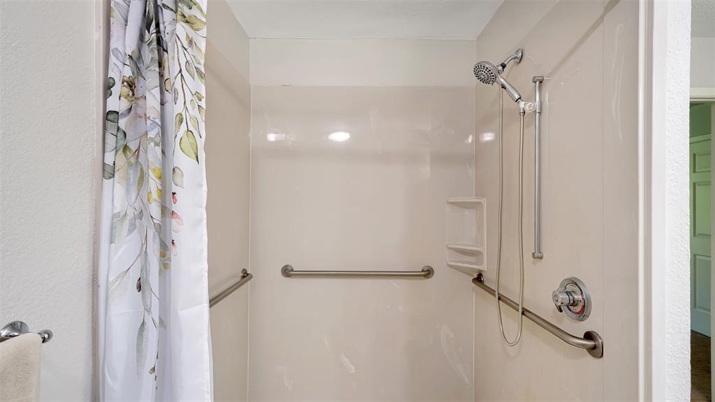 2801 Florence Street Kilgore, TX 75662 - Photo 25 of 39 a bathroom with a shower