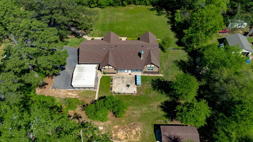 2801 Florence Street Kilgore, TX 75662 - Photo 39 of 39 an aerial view of a house with a garden