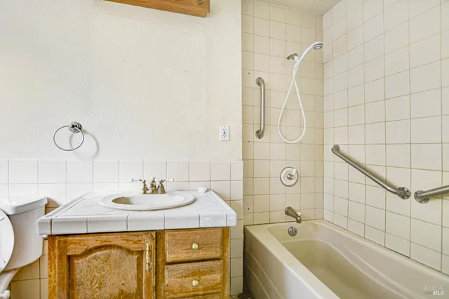 a backyard of a house with seating space