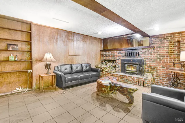 a living room with furniture and a table