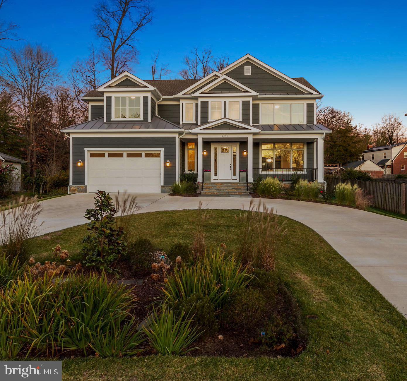 7811 Aberdeen Road Bethesda, MD 20814 - Photo 2 of 18 a front view of a house with a yard