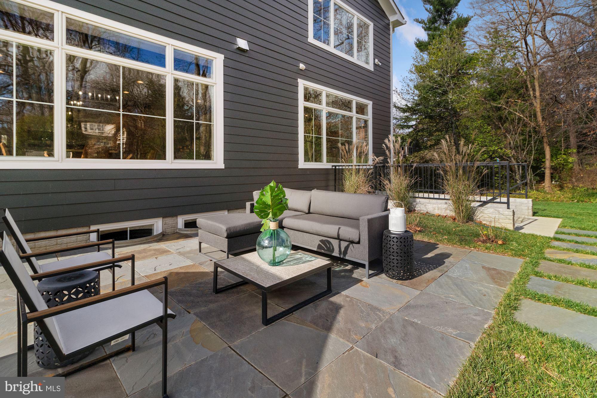 7811 Aberdeen Road Bethesda, MD 20814 - Photo 12 of 18 a building outdoor space with patio furniture