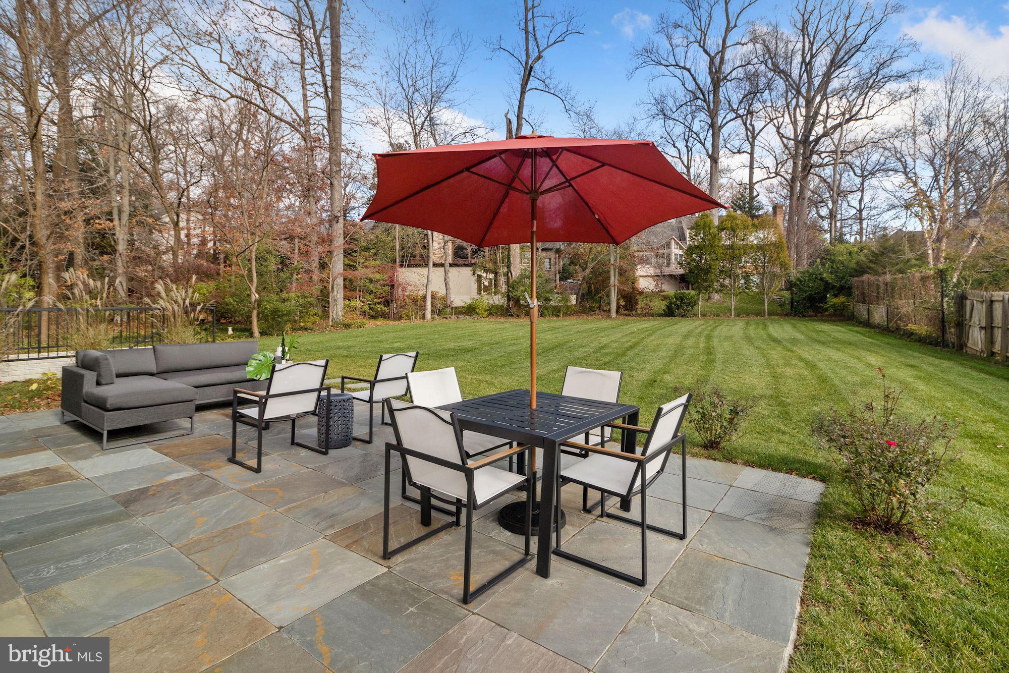 7811 Aberdeen Road Bethesda, MD 20814 - Photo 14 of 18 a view of a backyard with sitting area and furniture