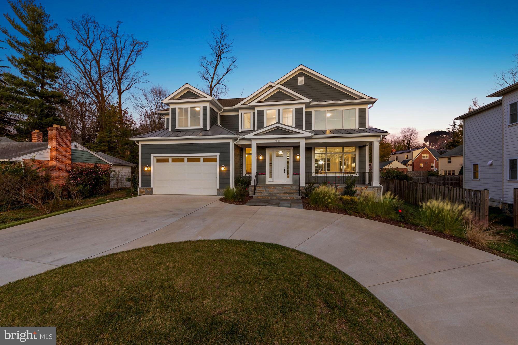 7811 Aberdeen Road Bethesda, MD 20814 - Photo 18 of 18 a front view of a house with a garden