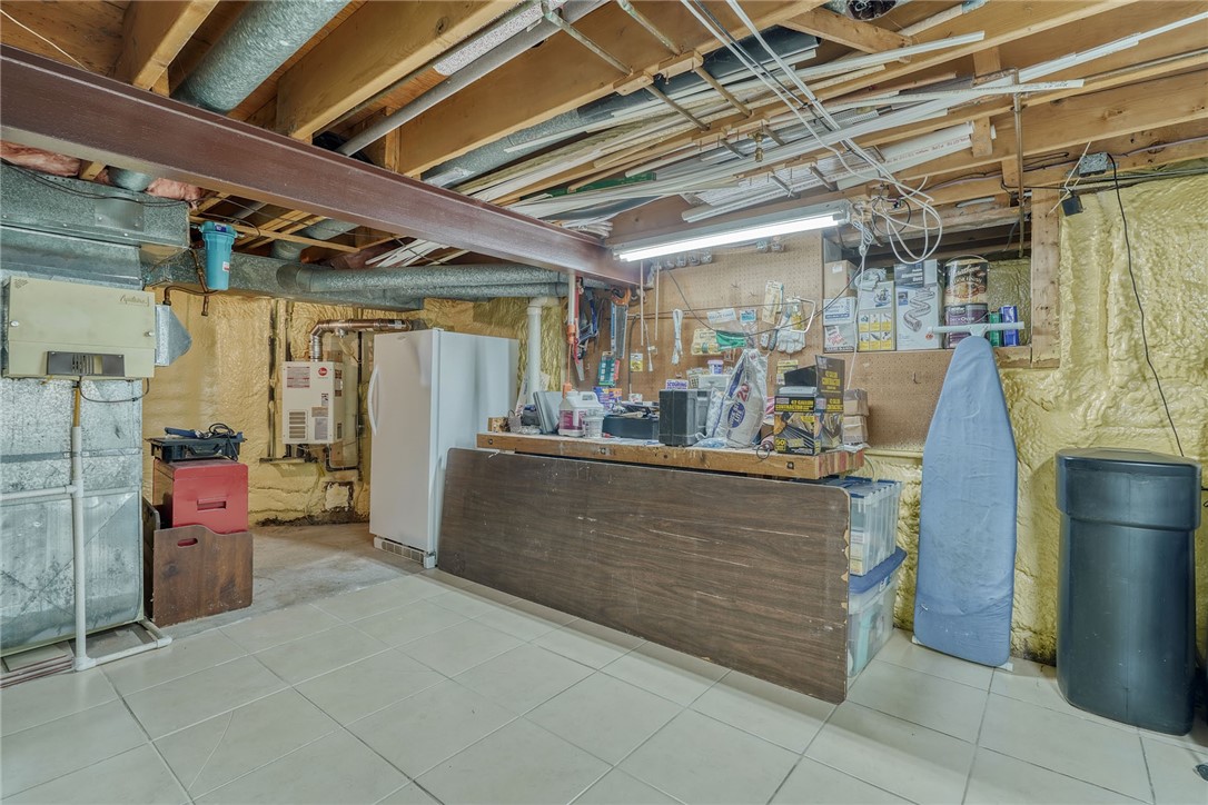 1616 Brattleboro Drive Webster, NY 14580 - Photo 44 of 50 UTILITY RM . .TANKLESS WTR HTR