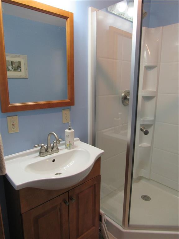 119 Eastern Drive Lower Burrell, PA 15068 - Photo 13 of 24 a bathroom with a sink and a mirror