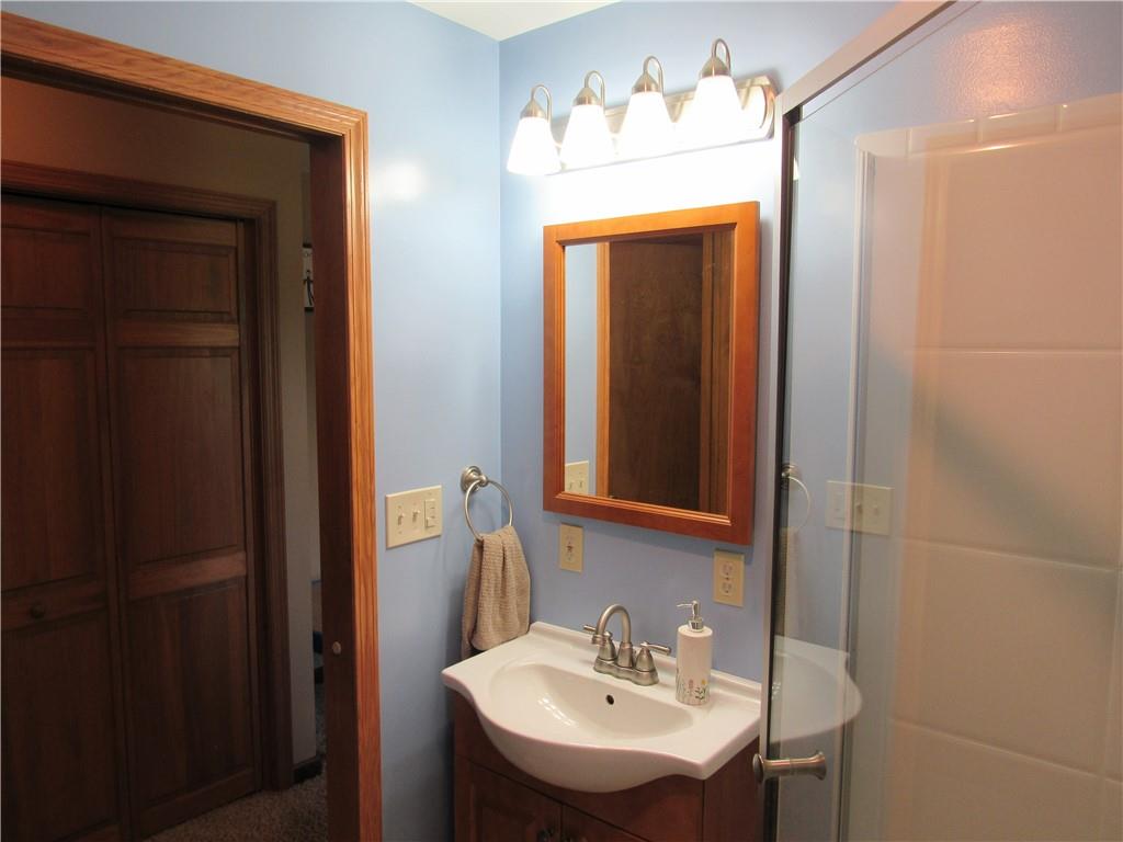 119 Eastern Drive Lower Burrell, PA 15068 - Photo 14 of 24 a bathroom with a sink and a mirror