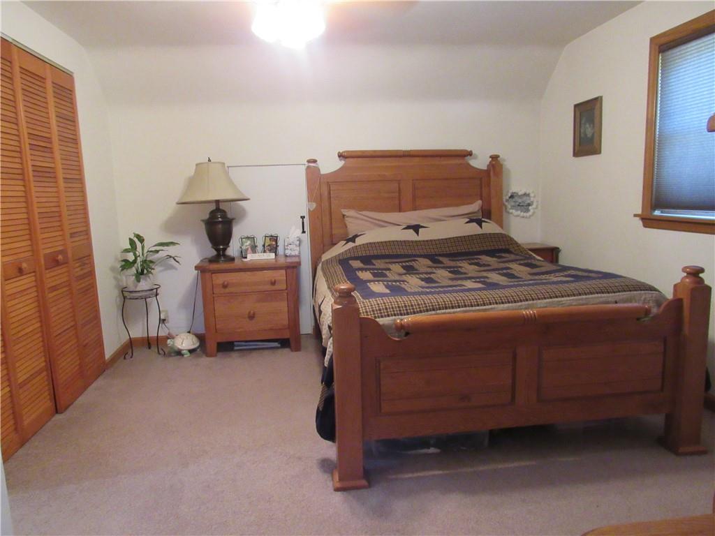 119 Eastern Drive Lower Burrell, PA 15068 - Photo 15 of 24 a bedroom with a bed and a cabinets