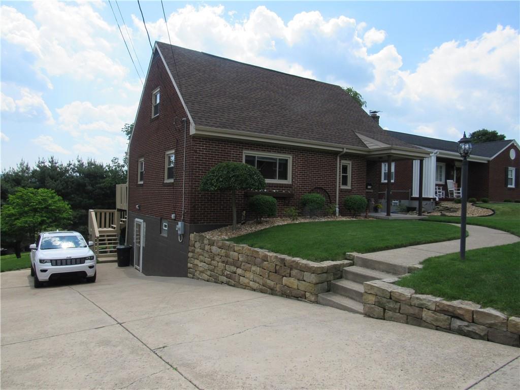 119 Eastern Drive Lower Burrell, PA 15068 - Photo 2 of 24 a car parked in front of a house