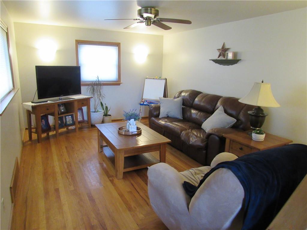 119 Eastern Drive Lower Burrell, PA 15068 - Photo 3 of 24 a living room with furniture and a flat screen tv