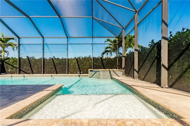 a view of a backyard with sitting area and furniture