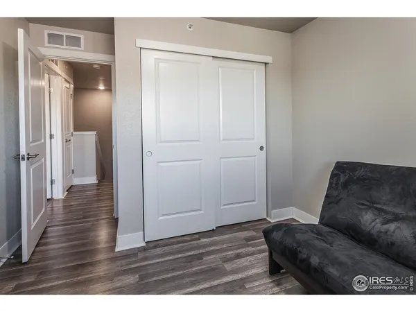 a living room with a bed