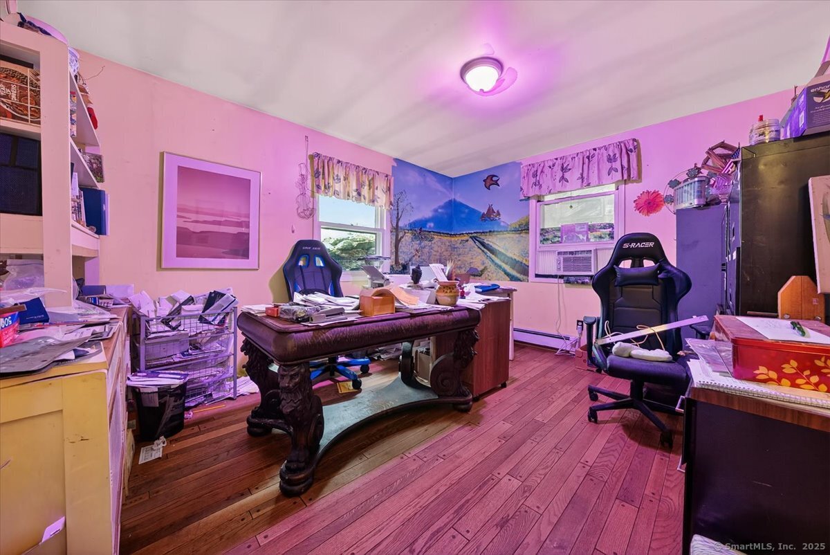 54 Mountain Road Wilton, CT 06897 - Photo 15 of 27 a living room with furniture and wooden floor
