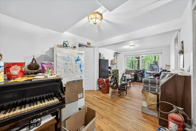 a view of a workspace with furniture and toys