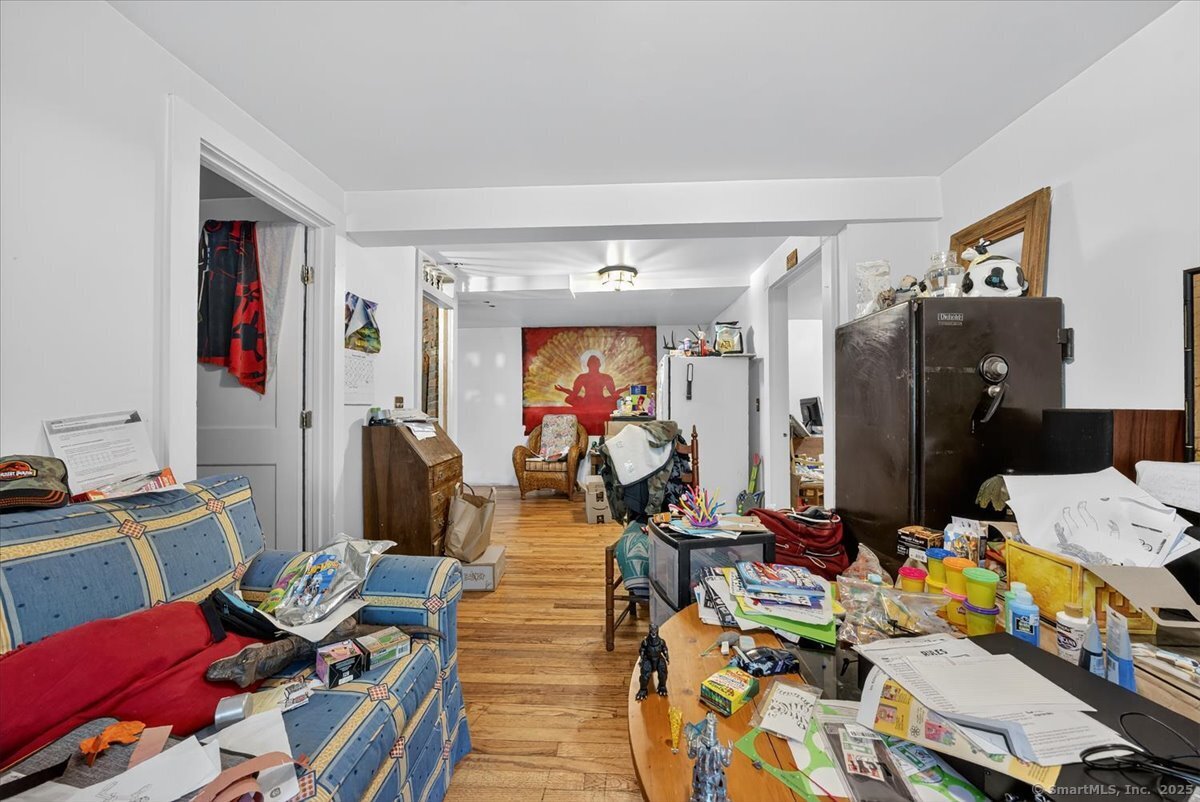 54 Mountain Road Wilton, CT 06897 - Photo 22 of 27 a view of a workspace with furniture and toys