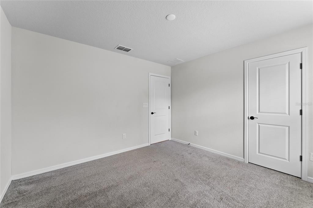 20602 Monza Loop Land O Lakes, FL 34638 - Photo 24 of 44 a view of an empty room