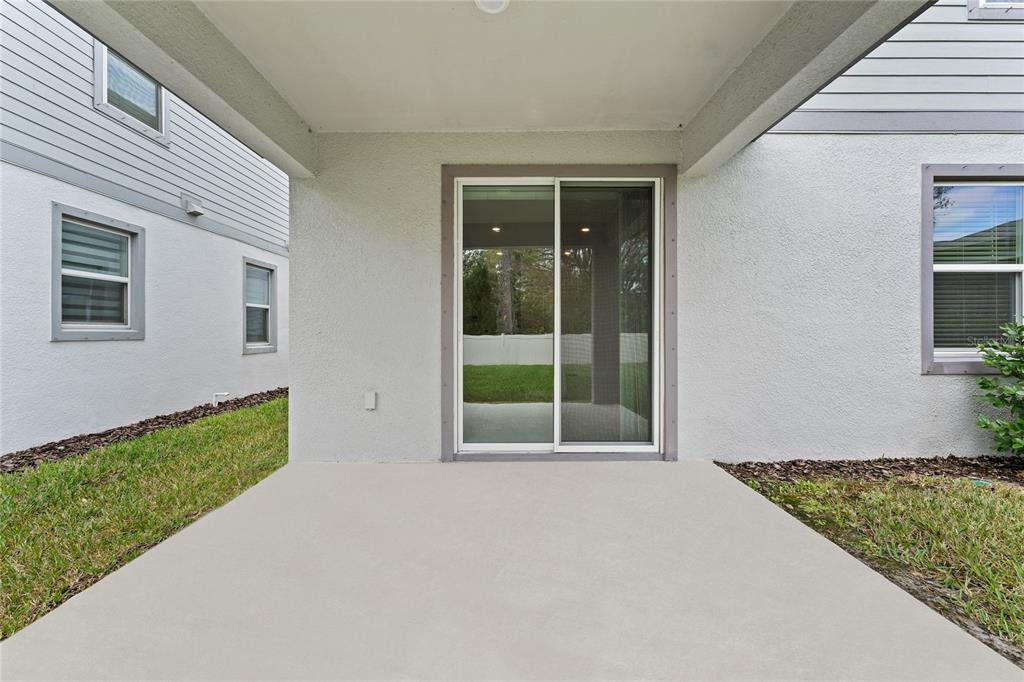 20602 Monza Loop Land O Lakes, FL 34638 - Photo 31 of 44 a view of an outdoor space and yard