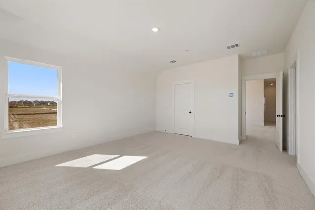 an empty room with a natural light