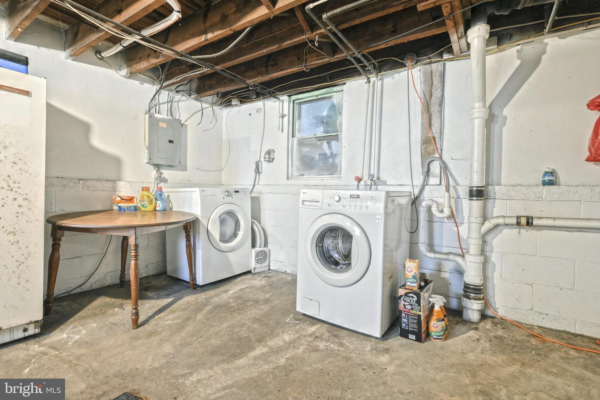 758 Village Road York, PA 17404 - Photo 28 of 29 Laundry Area Washer/Dryer/Folding Table Stay