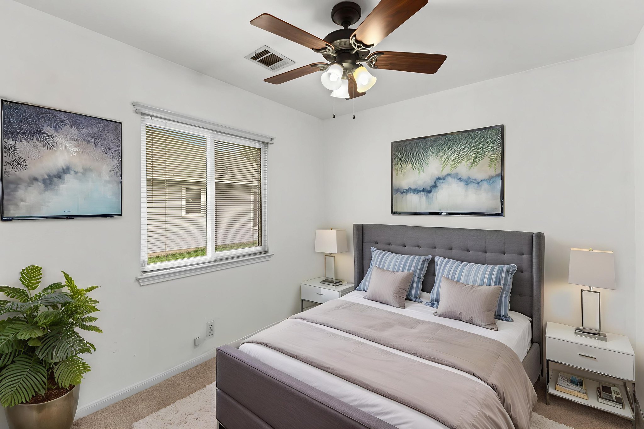 290 Bailey Loop Kyle, TX 78640 - Photo 24 of 33 Visually staged. Bedroom featuring carpet flooring, a ceiling fan with light fixture, and a window with blinds