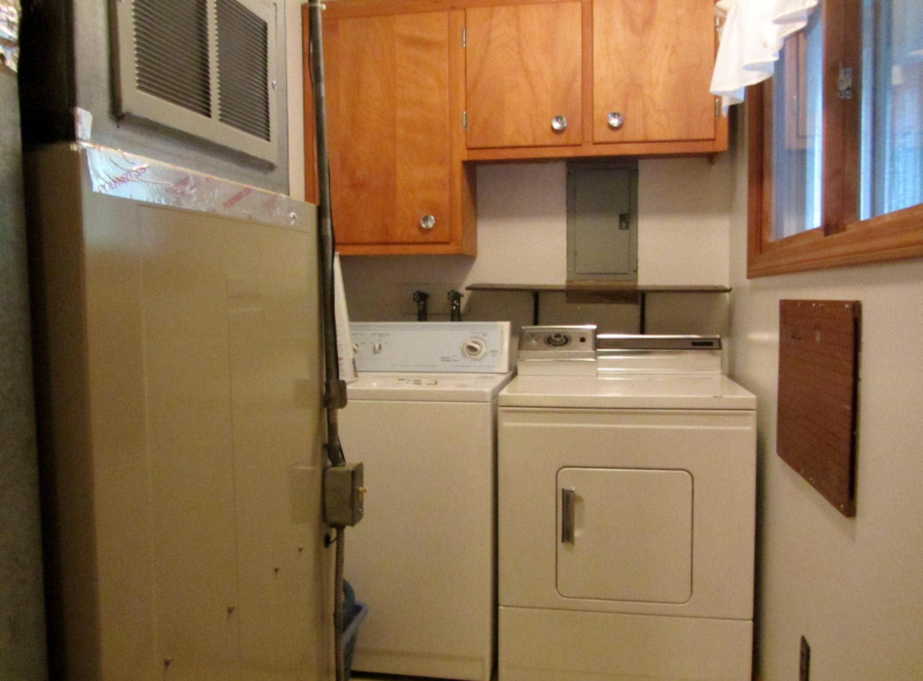 5072 Sandy Run Road Sears, MI 49679 - Photo 12 of 16 utility with furnace