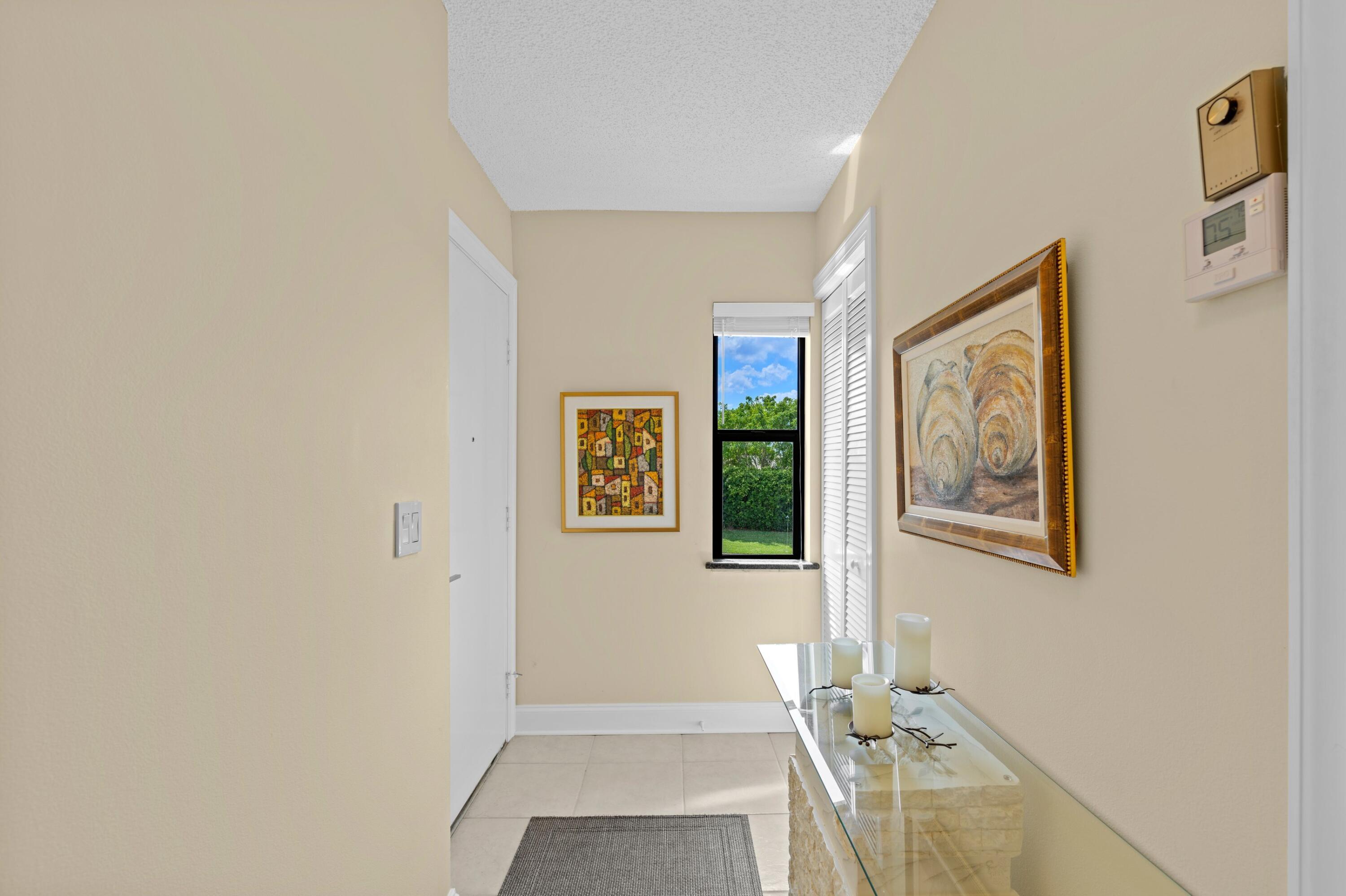 21757 Arriba Real, Unit 30H Boca Raton, FL 33433 - Photo 13 of 26 Foyer