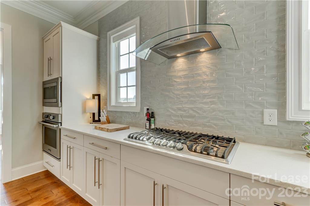 570 Crawfish Drive Fort Mill, SC 29708 - Photo 12 of 48 a kitchen with a sink stove and refrigerator