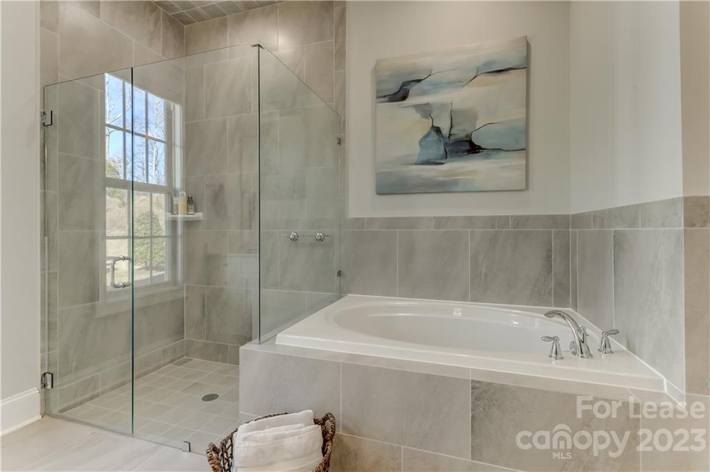 570 Crawfish Drive Fort Mill, SC 29708 - Photo 25 of 48 a bathroom with a tub and shower