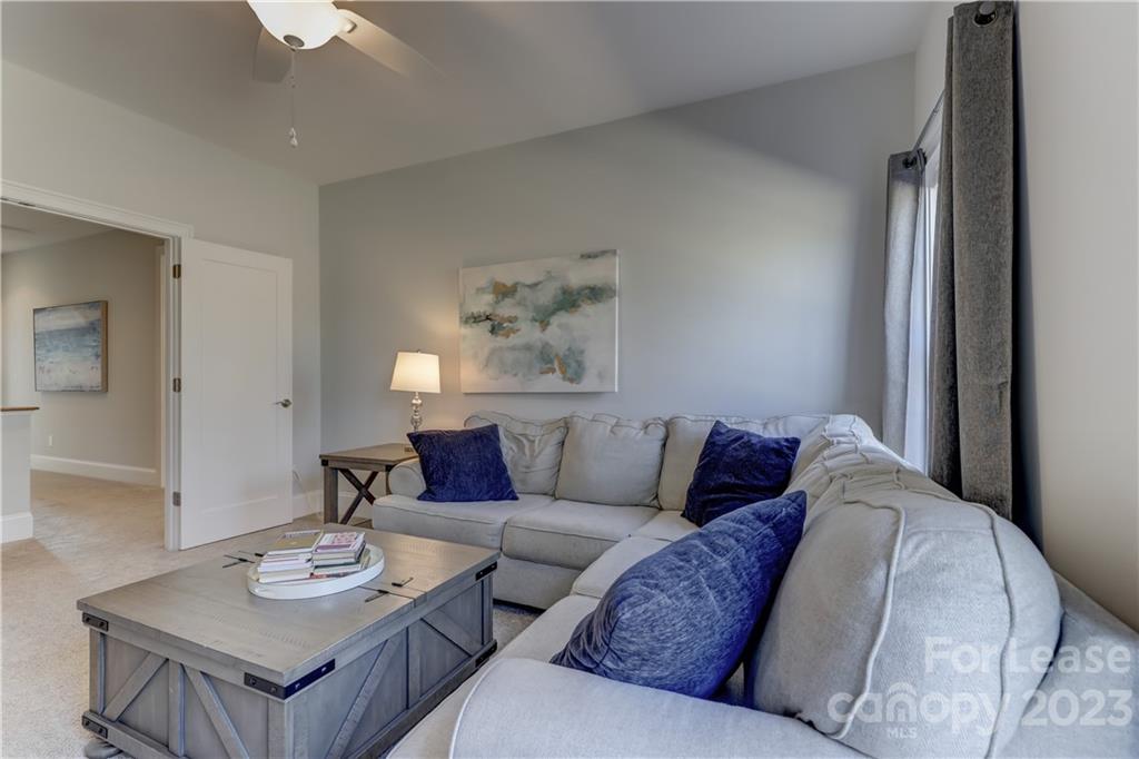 570 Crawfish Drive Fort Mill, SC 29708 - Photo 33 of 48 a living room with furniture and a table