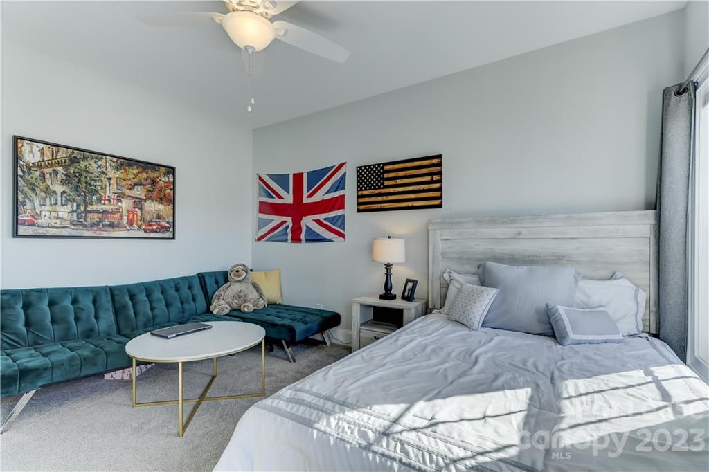 570 Crawfish Drive Fort Mill, SC 29708 - Photo 37 of 48 a bedroom with furniture and a chair