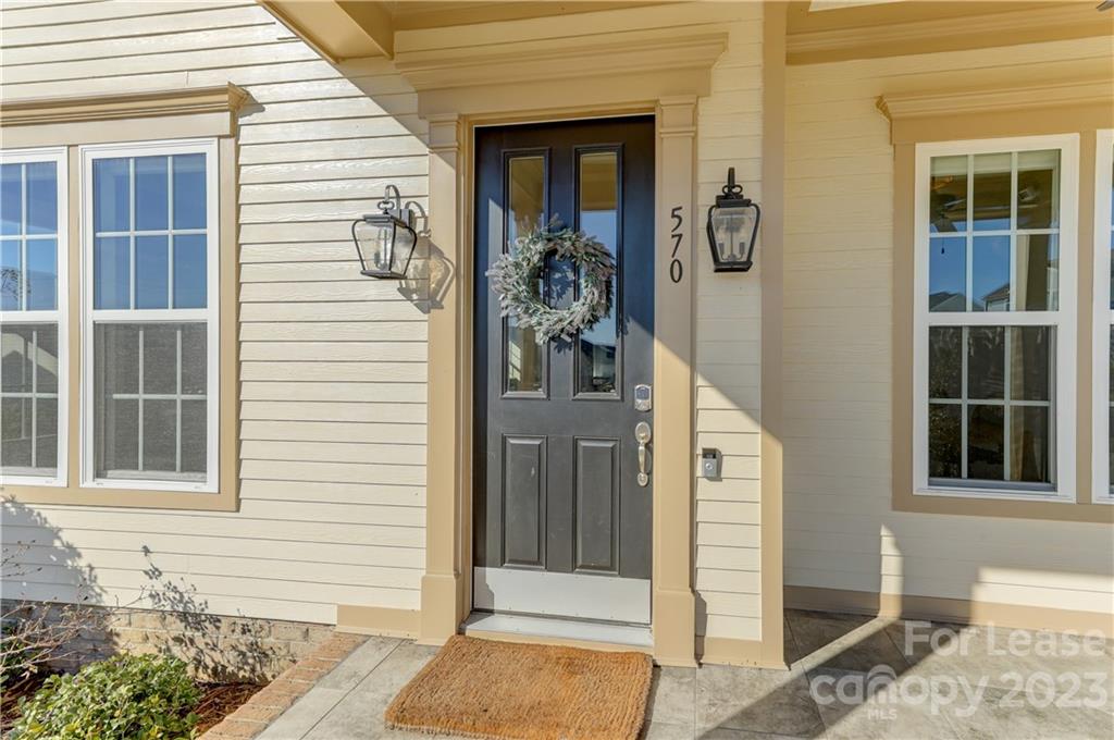 570 Crawfish Drive Fort Mill, SC 29708 - Photo 4 of 48 a front view of a house with a porch