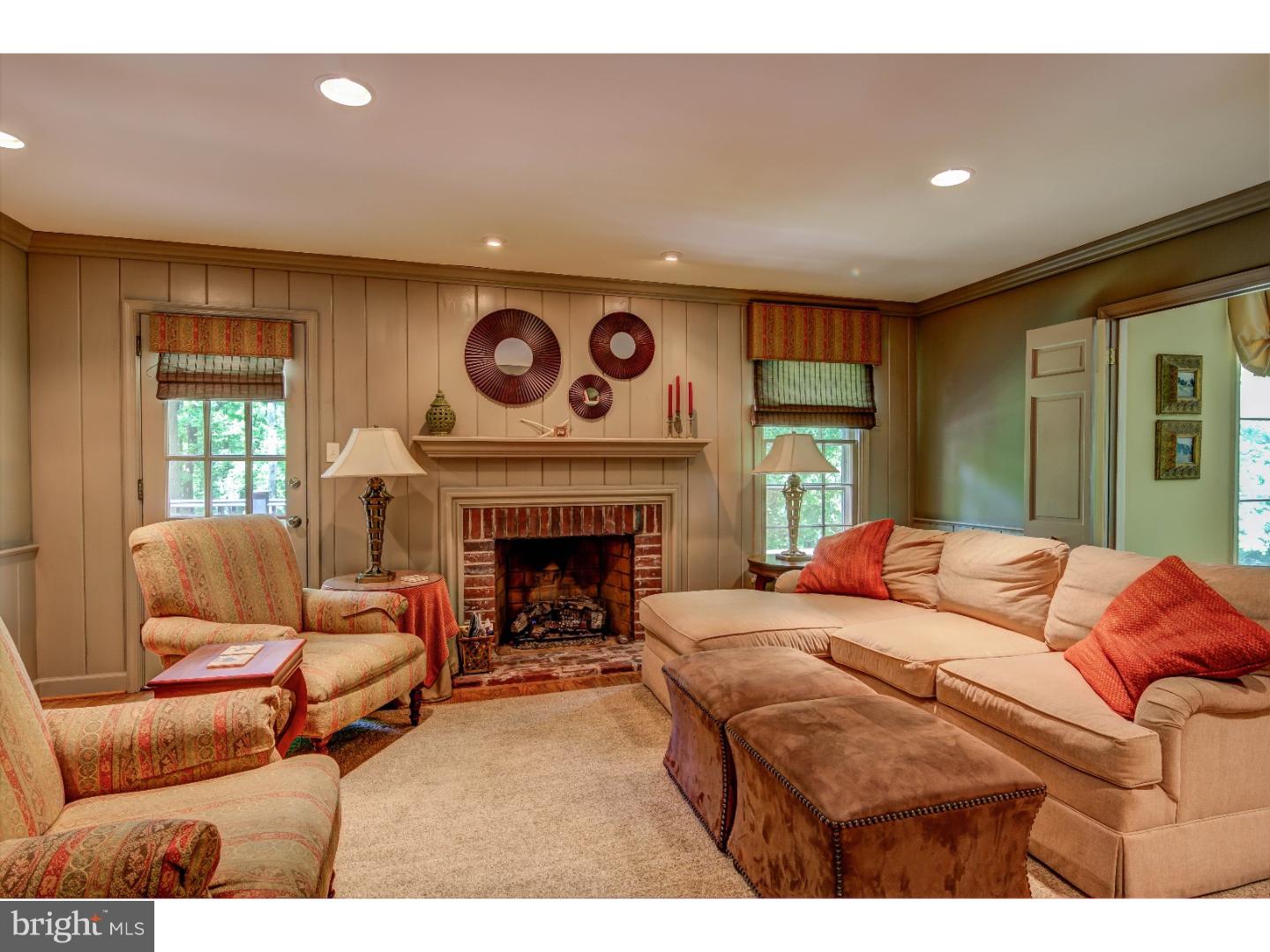 640 Malin Road Newtown Square, PA 19073 - Photo 12 of 24 a living room with furniture and a fireplace