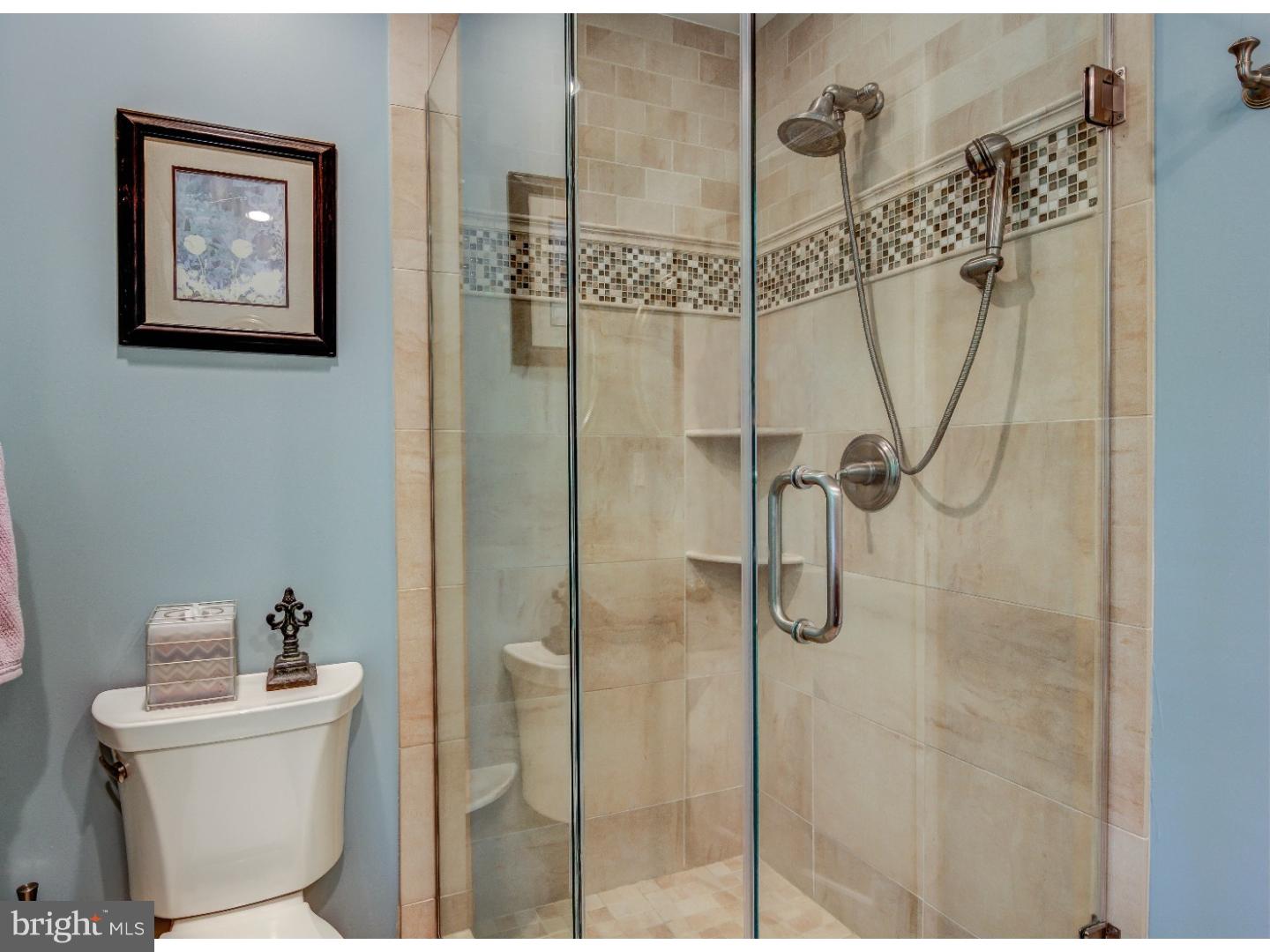 640 Malin Road Newtown Square, PA 19073 - Photo 16 of 24 a bathroom with a shower a toilet and a sink