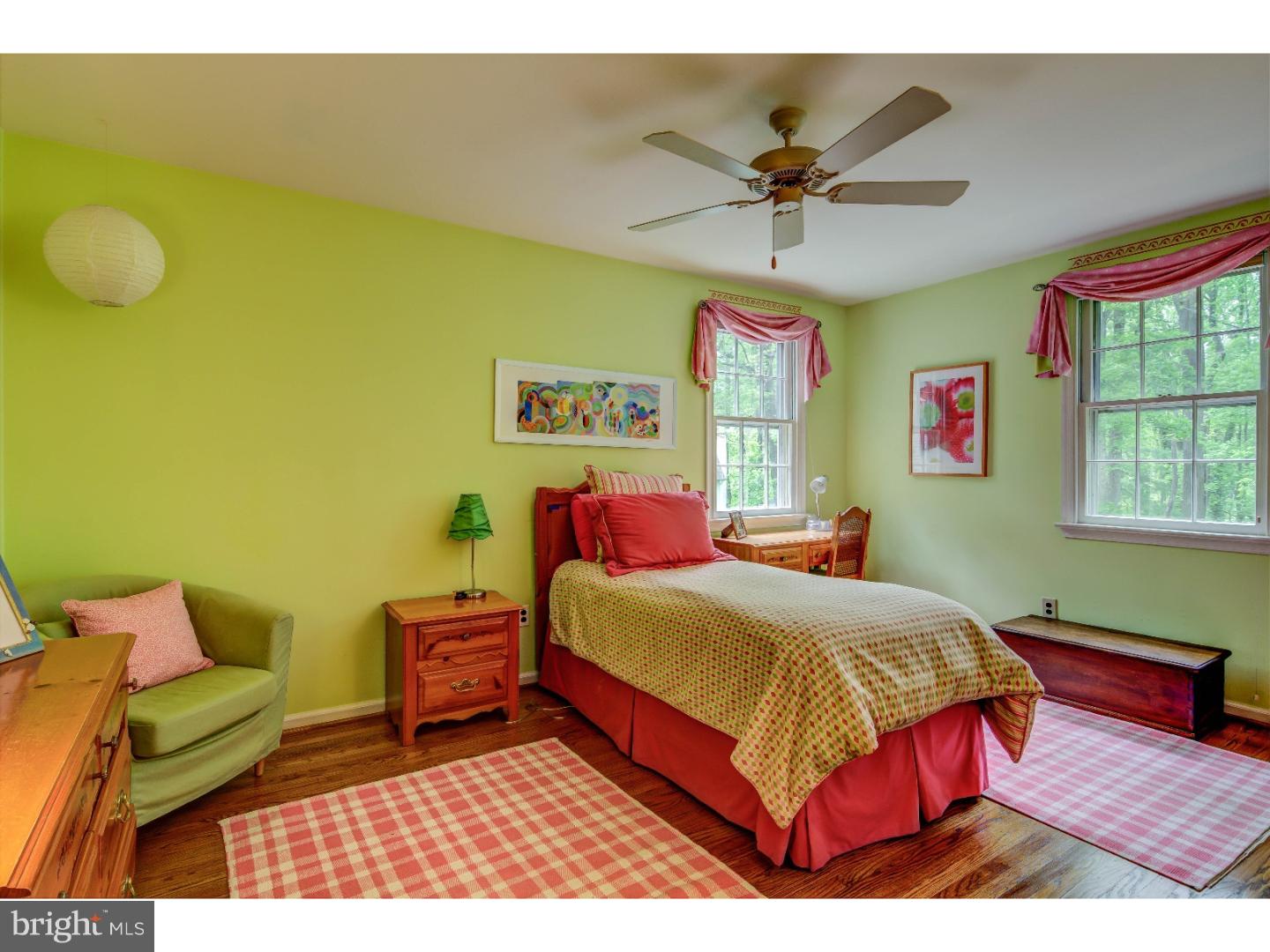 640 Malin Road Newtown Square, PA 19073 - Photo 19 of 24 a bedroom with a bed and window