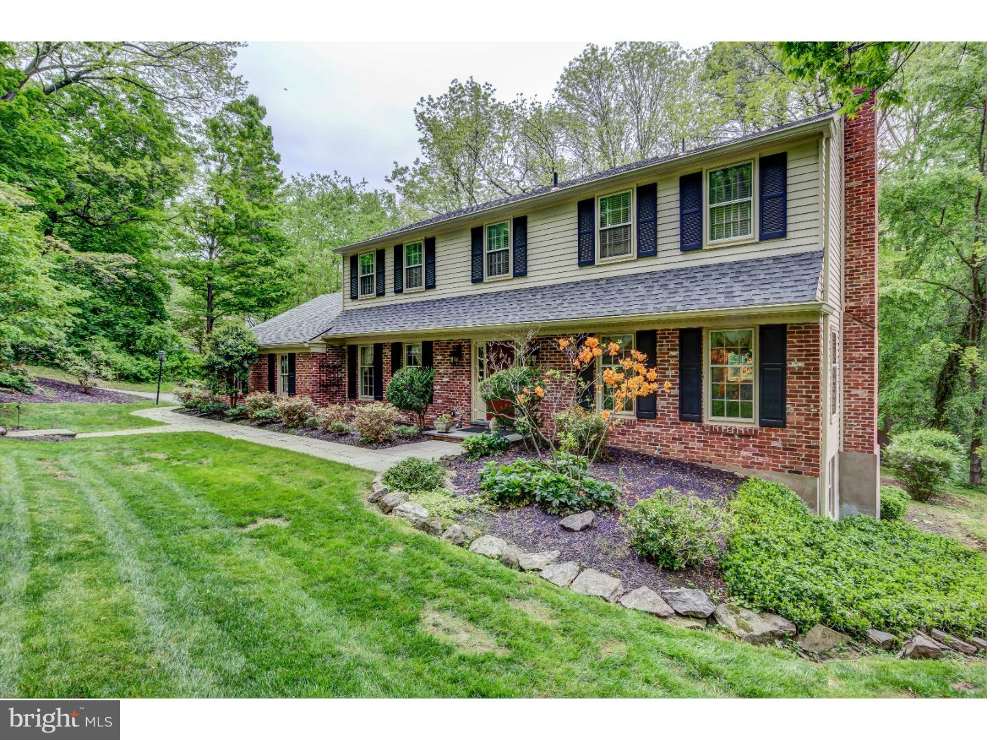 640 Malin Road Newtown Square, PA 19073 - Photo 24 of 24 a front view of a house with garden and porch