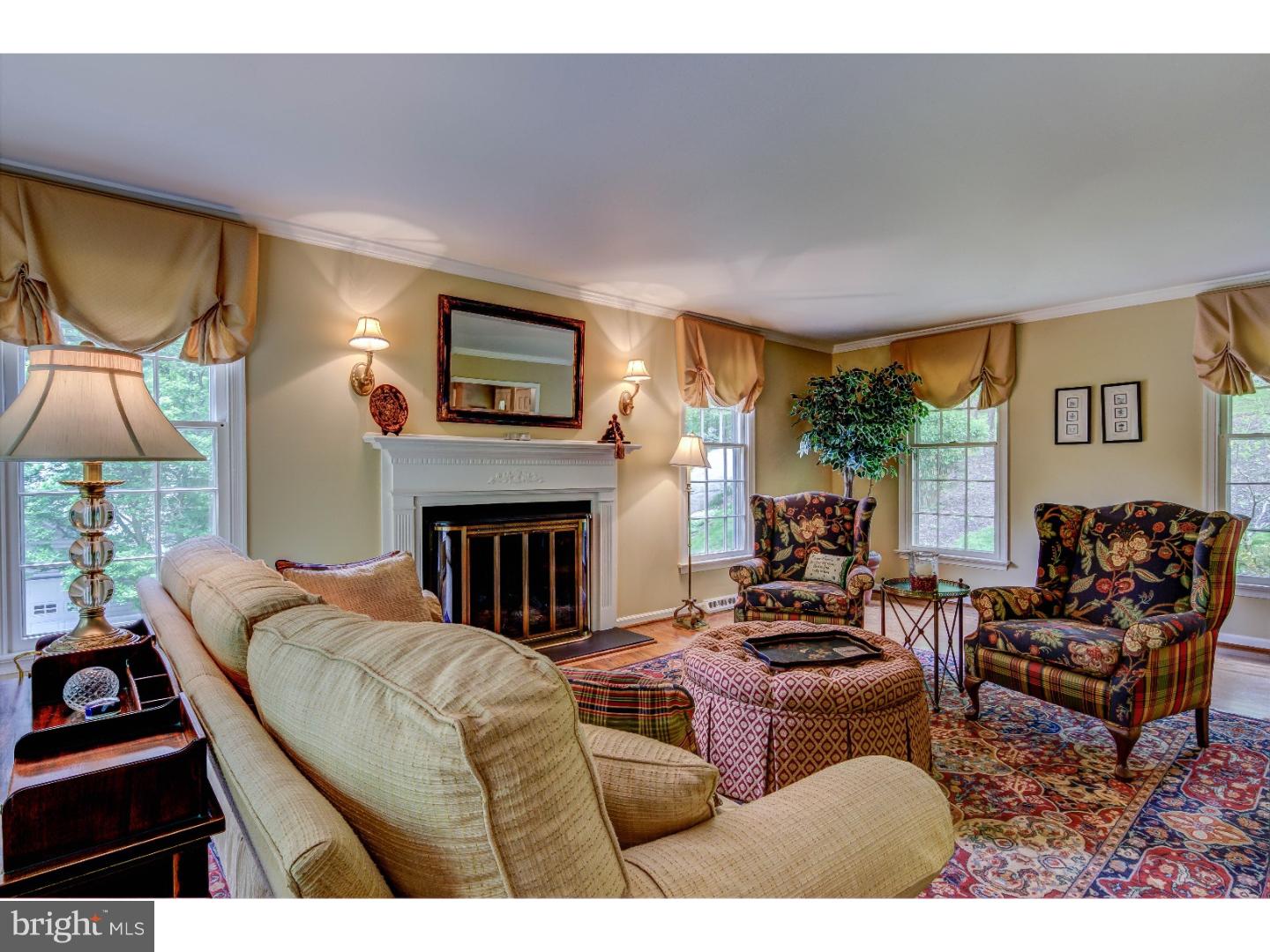 640 Malin Road Newtown Square, PA 19073 - Photo 6 of 24 a living room with furniture and a fireplace