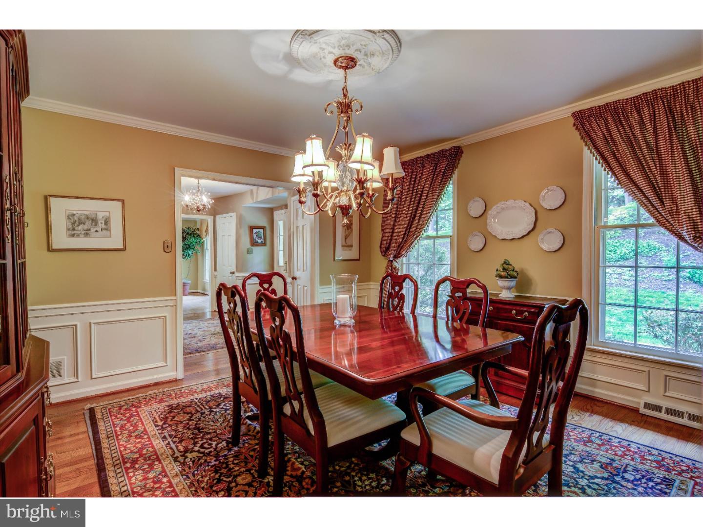 640 Malin Road Newtown Square, PA 19073 - Photo 7 of 24 a view of a dining room with furniture and chandelier
