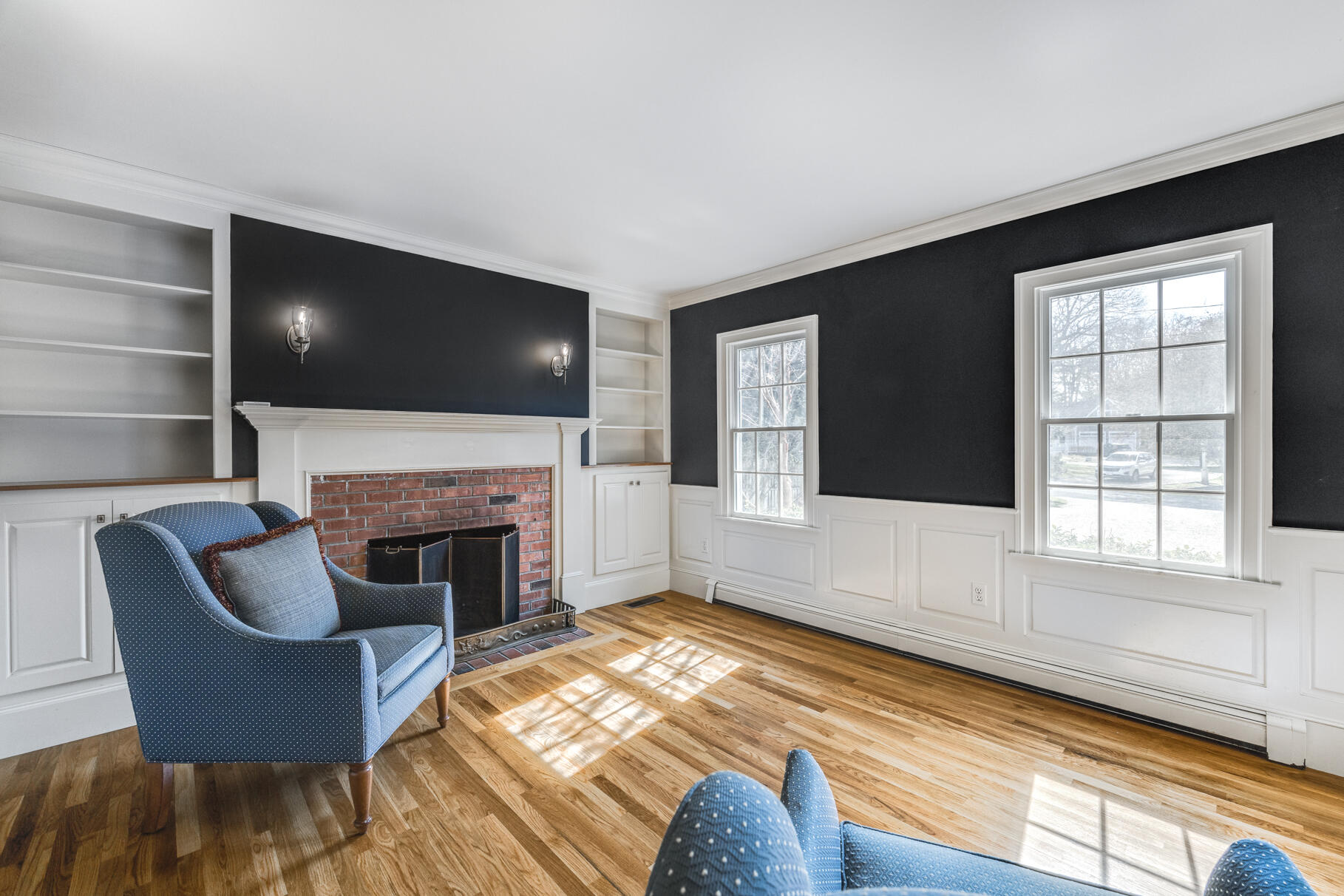 25 Blanid Road Osterville, MA 02655 - Photo 14 of 27 a living room with furniture and a fireplace