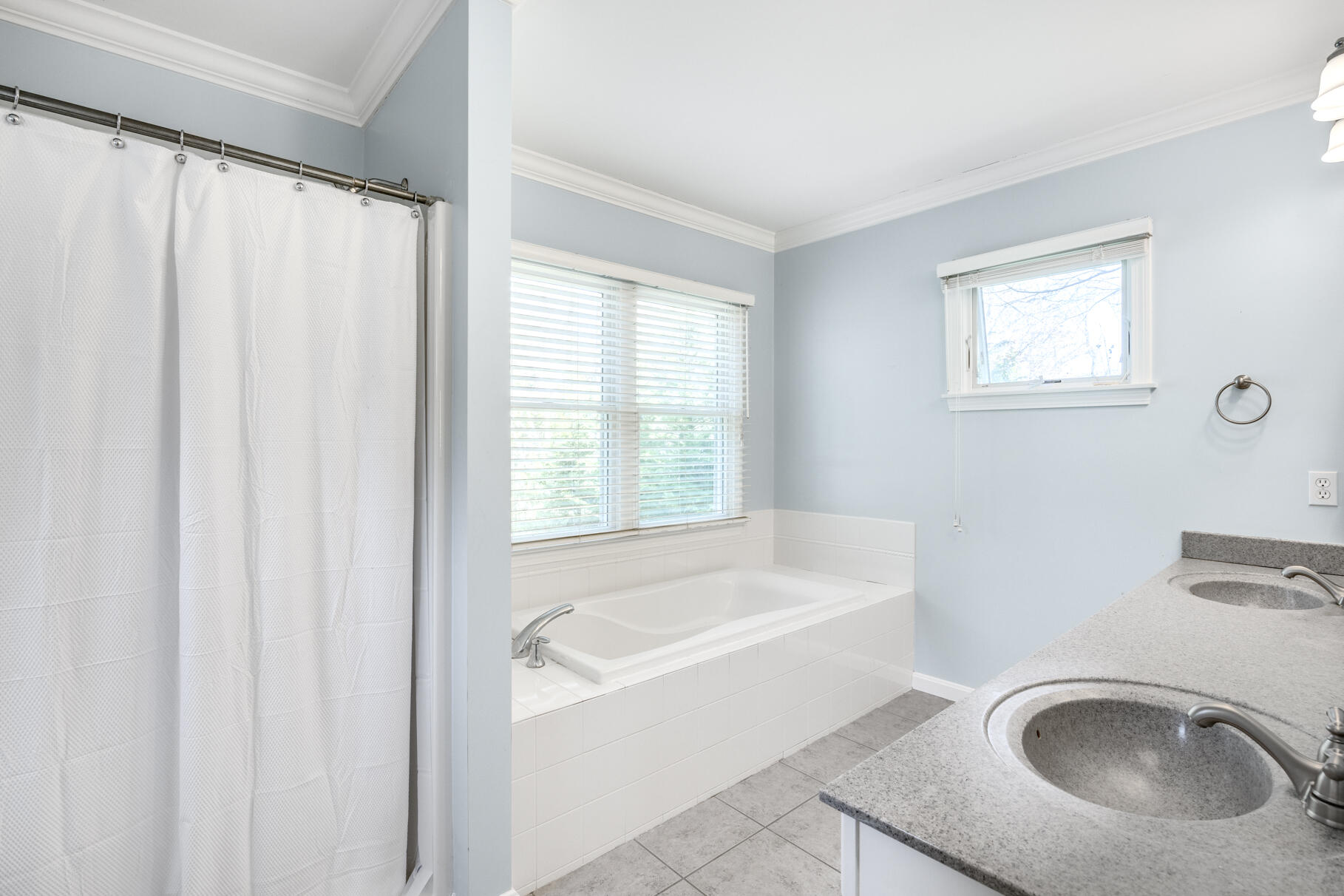 25 Blanid Road Osterville, MA 02655 - Photo 17 of 27 a white bath tub sitting next to a sink