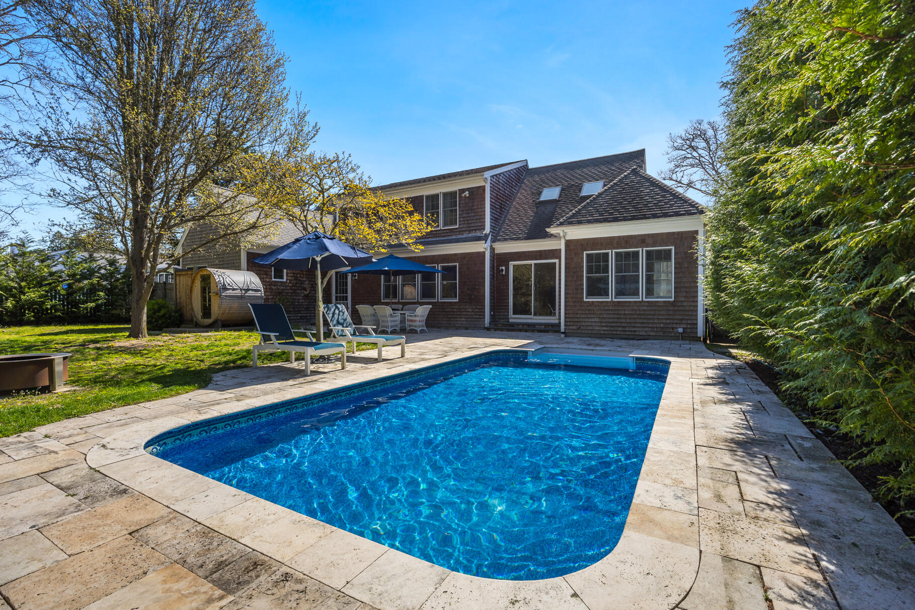 25 Blanid Road Osterville, MA 02655 - Photo 2 of 27 a view of house with swimming pool outdoor seating and yard