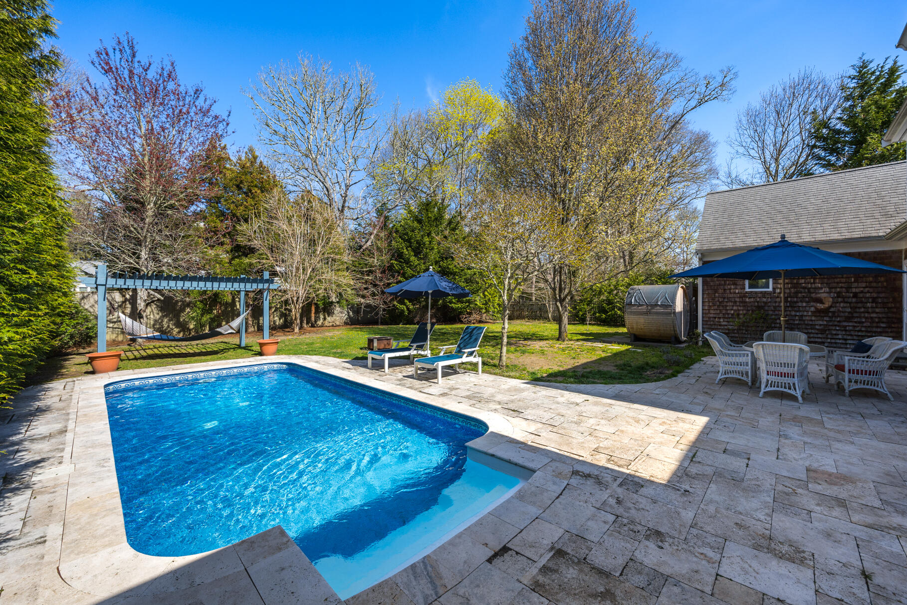 25 Blanid Road Osterville, MA 02655 - Photo 24 of 27 a view of a swimming pool with chair and tables