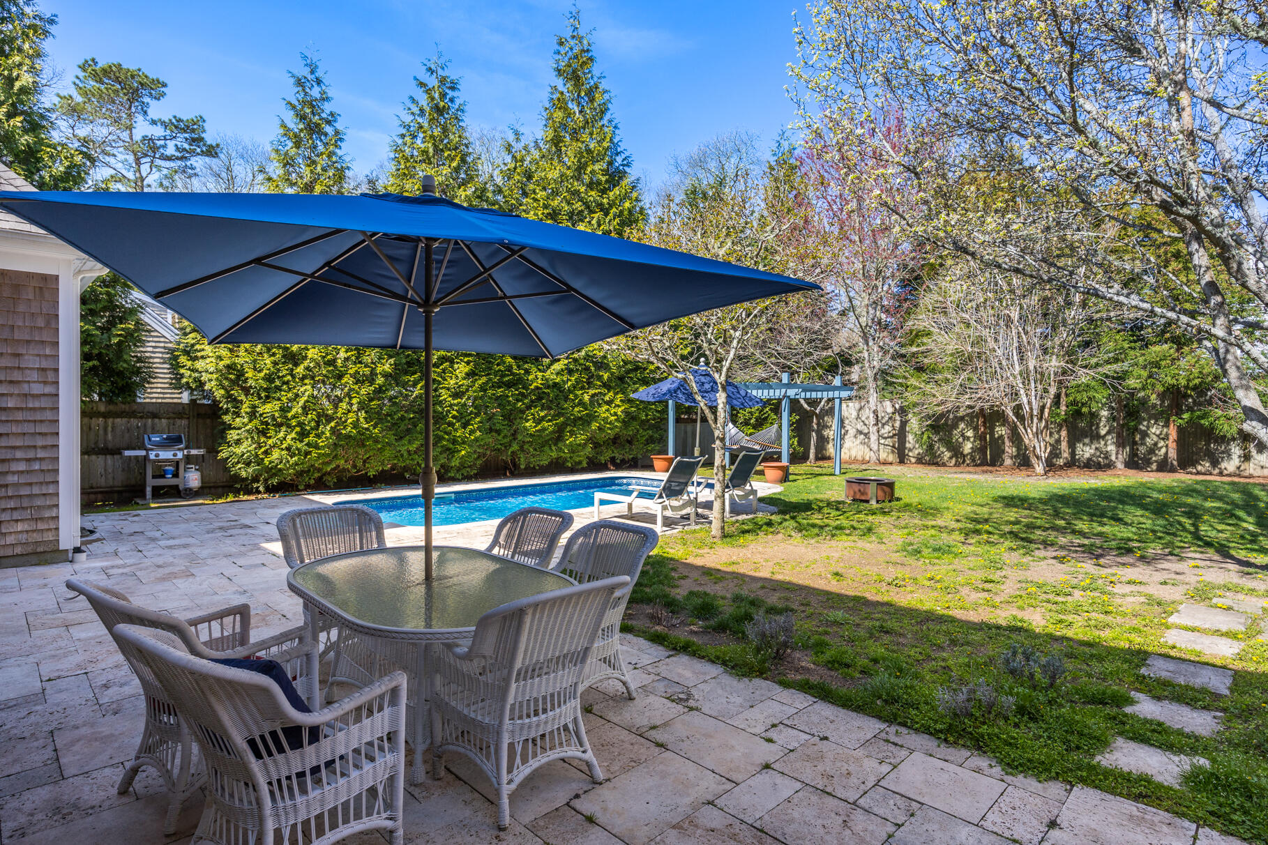 25 Blanid Road Osterville, MA 02655 - Photo 25 of 27 a view of a backyard with sitting area and furniture
