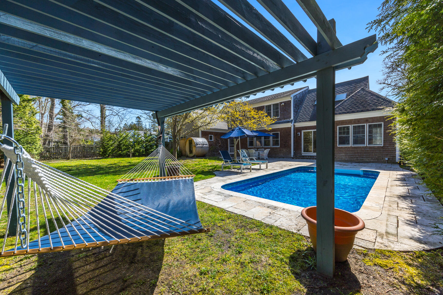 25 Blanid Road Osterville, MA 02655 - Photo 26 of 27 a view of a patio with wooden floor