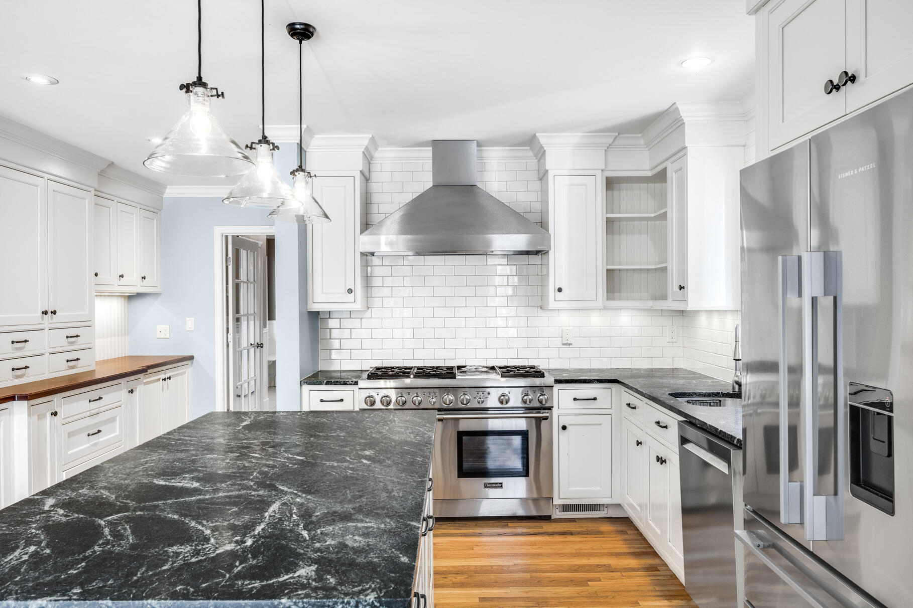 25 Blanid Road Osterville, MA 02655 - Photo 10 of 27 a kitchen with stainless steel appliances granite countertop a stove a sink and a refrigerator