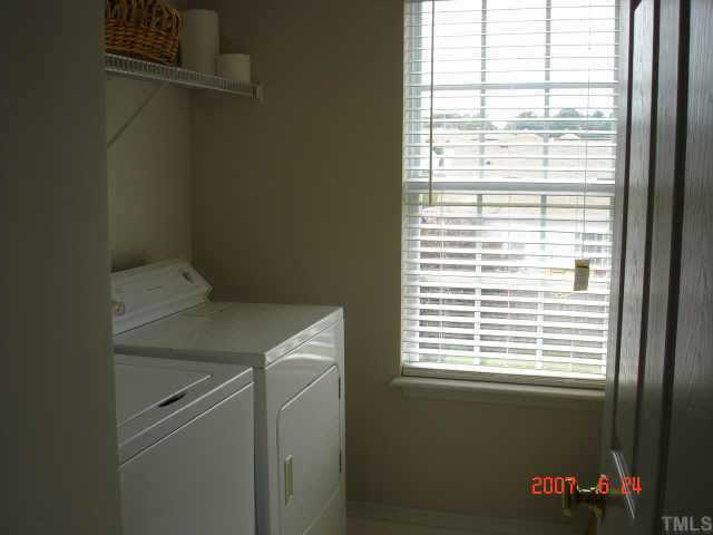 4445 Whatley Lane Raleigh, NC 27604 - Photo 7 of 9 Utility with washer and dryer that convey