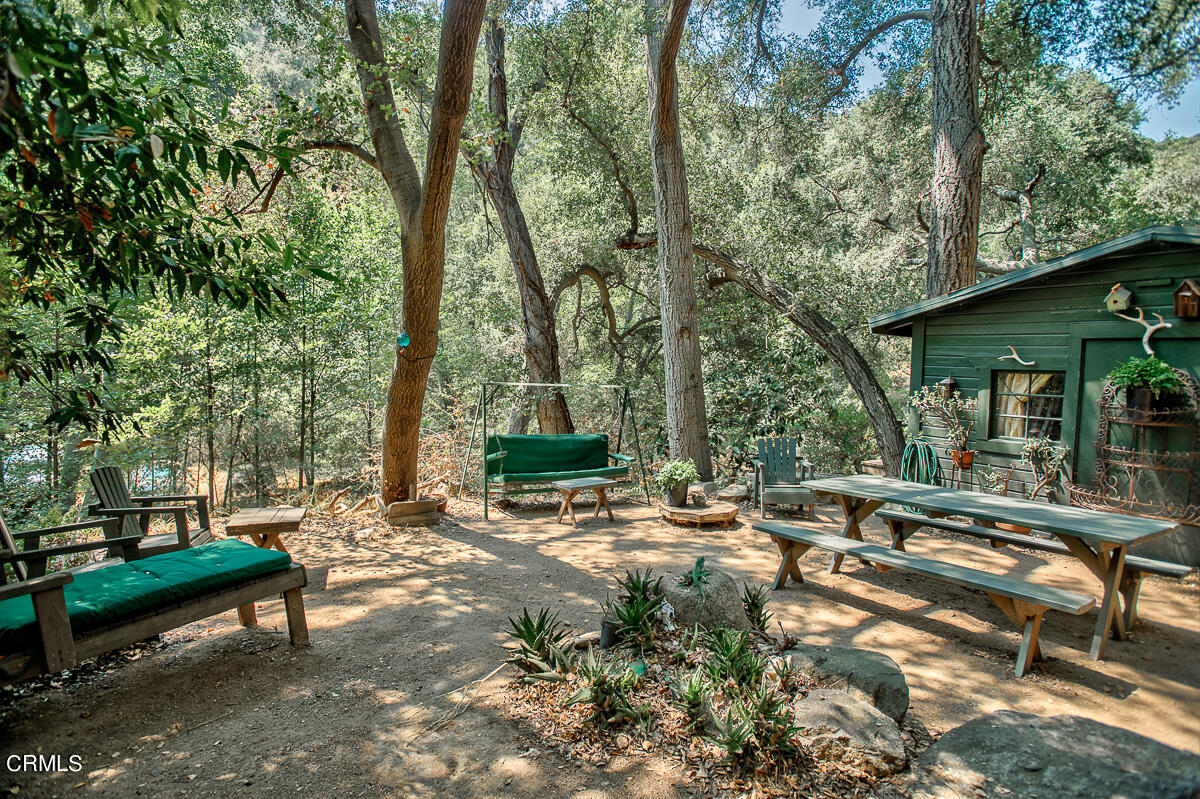 Undisclosed Address Altadena, CA 91001 - Photo 15 of 23 a view of a bench in a backyard
