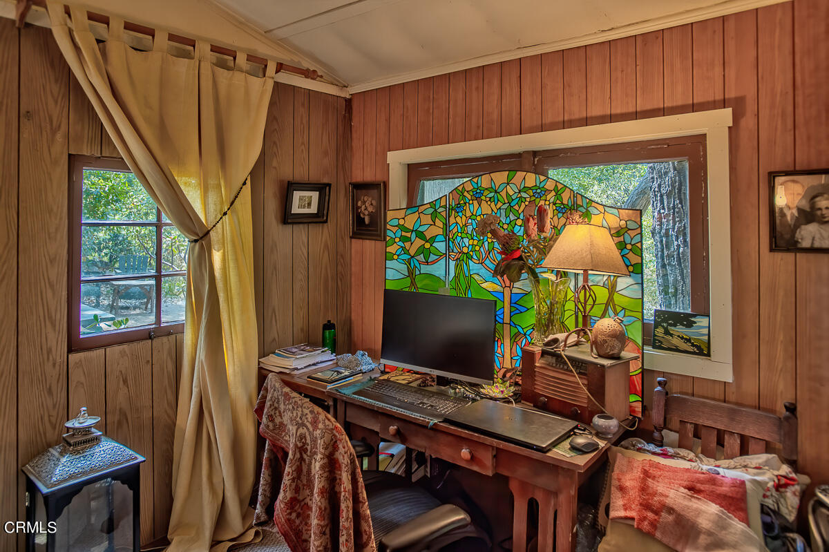 Undisclosed Address Altadena, CA 91001 - Photo 8 of 23 a view of a workspace with furniture and a window
