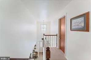 a view of a hallway with entryway