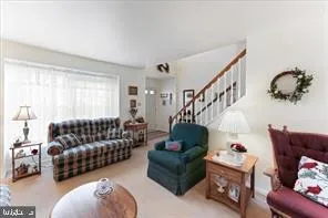 a living room with furniture and a couch